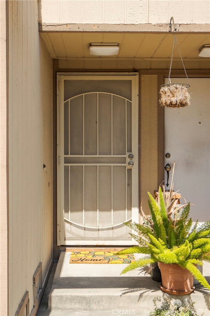 Property Photo:  12828 Ramona Boulevard 65  CA 91706 