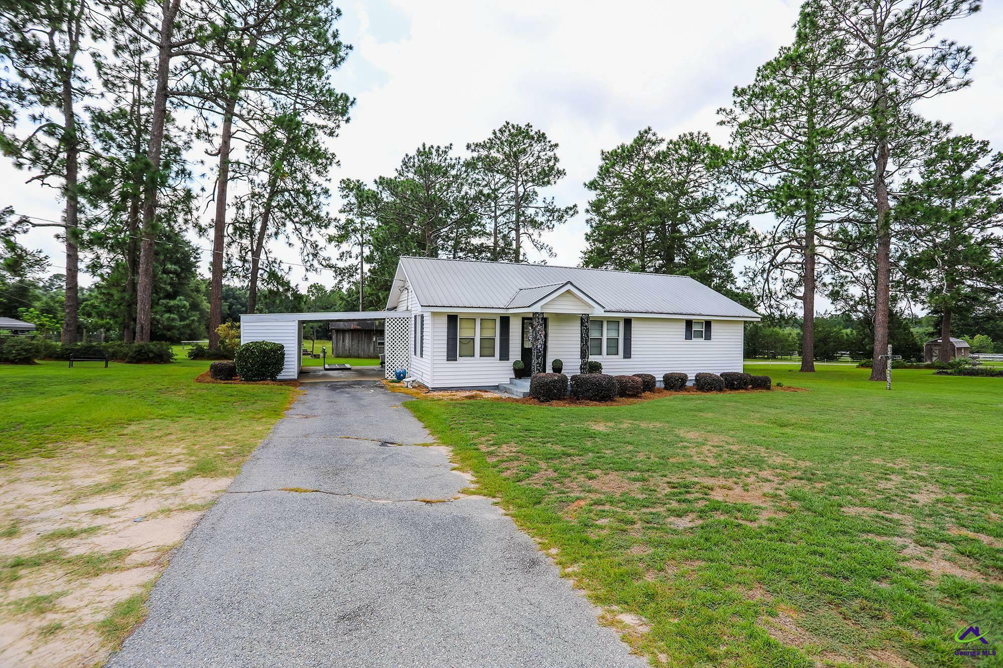 Property Photo:  242 Eastman Highway  GA 31036 