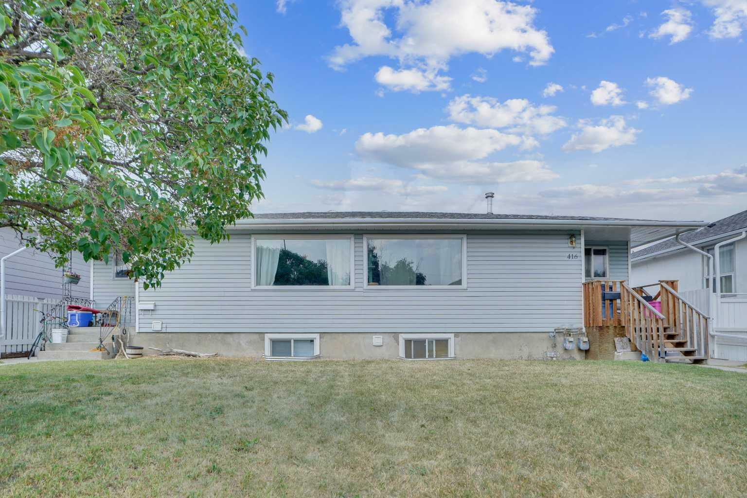 Property Photo:  416/416A/416B/414 54 Avenue SW  AB T2V 0C5 