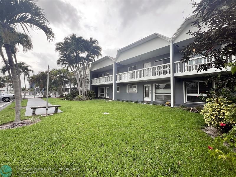 Property Photo:  1125 NW 30 8  FL 33311