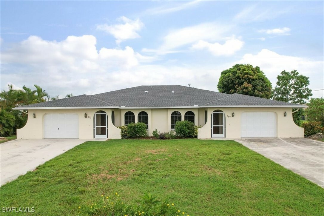 Property Photo:  811 SW 40th Terrace  FL 33914 