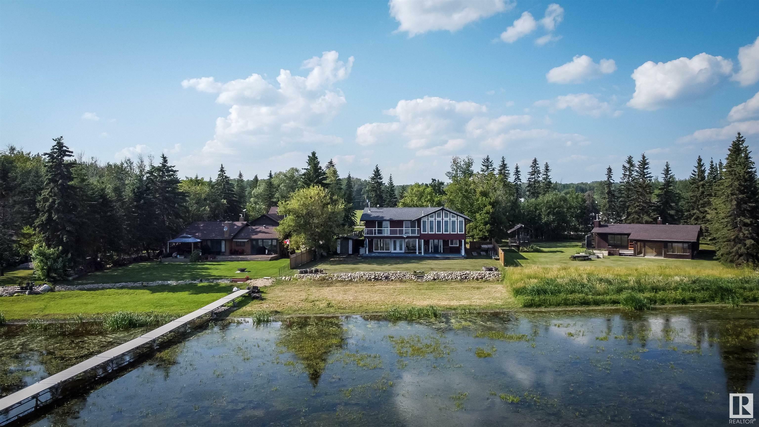 Property Photo:  102 Parkins Avenue  AB T0E 1A0 