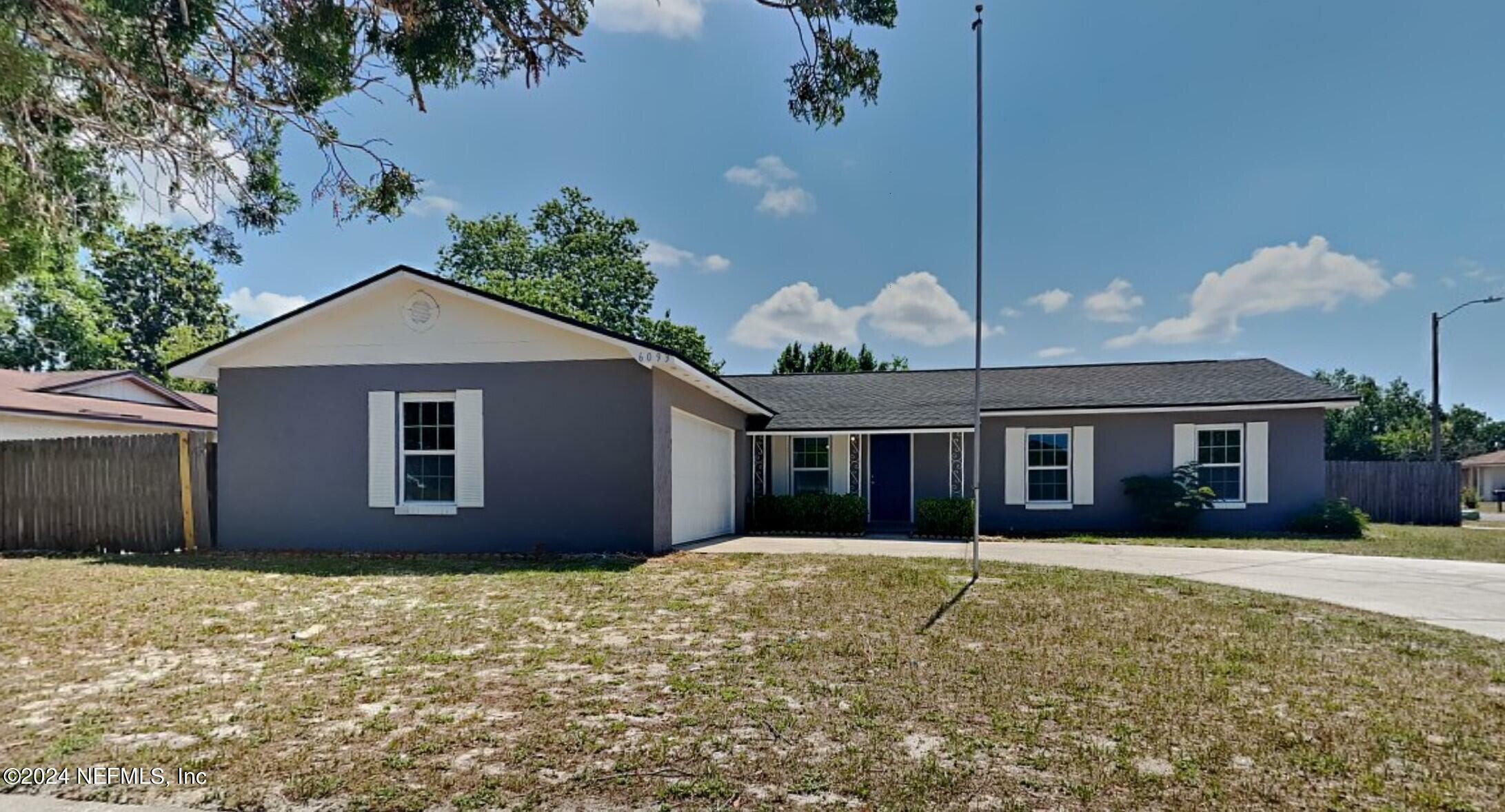 Property Photo:  6093 Anglia Drive  FL 32244 