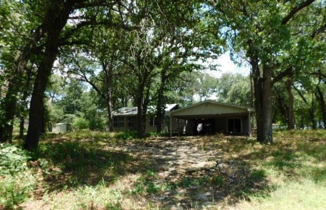 Property Photo:  408 County Road 4856  TX 76071 