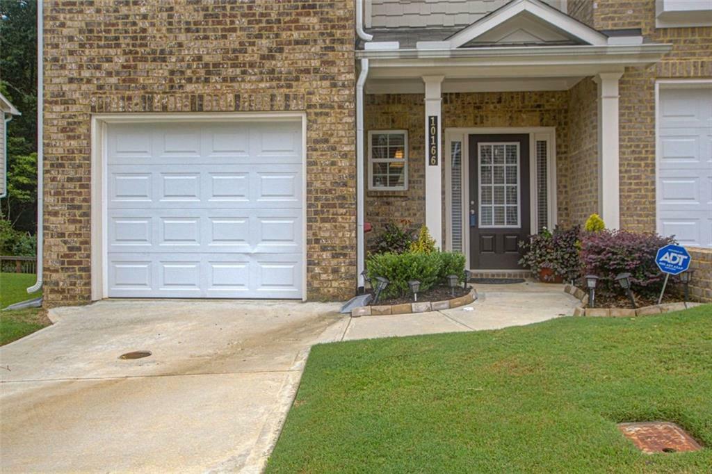 Property Photo:  10166 Benton Woods Drive  GA 30014 