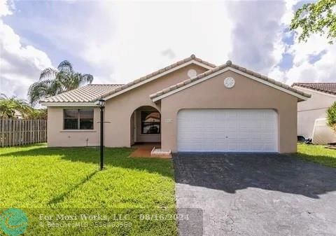 Property Photo: 5910 Epsom Ln FL 33331