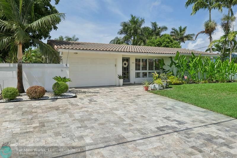 Property Photo:  2611 NE 53rd Ct  FL 33064 