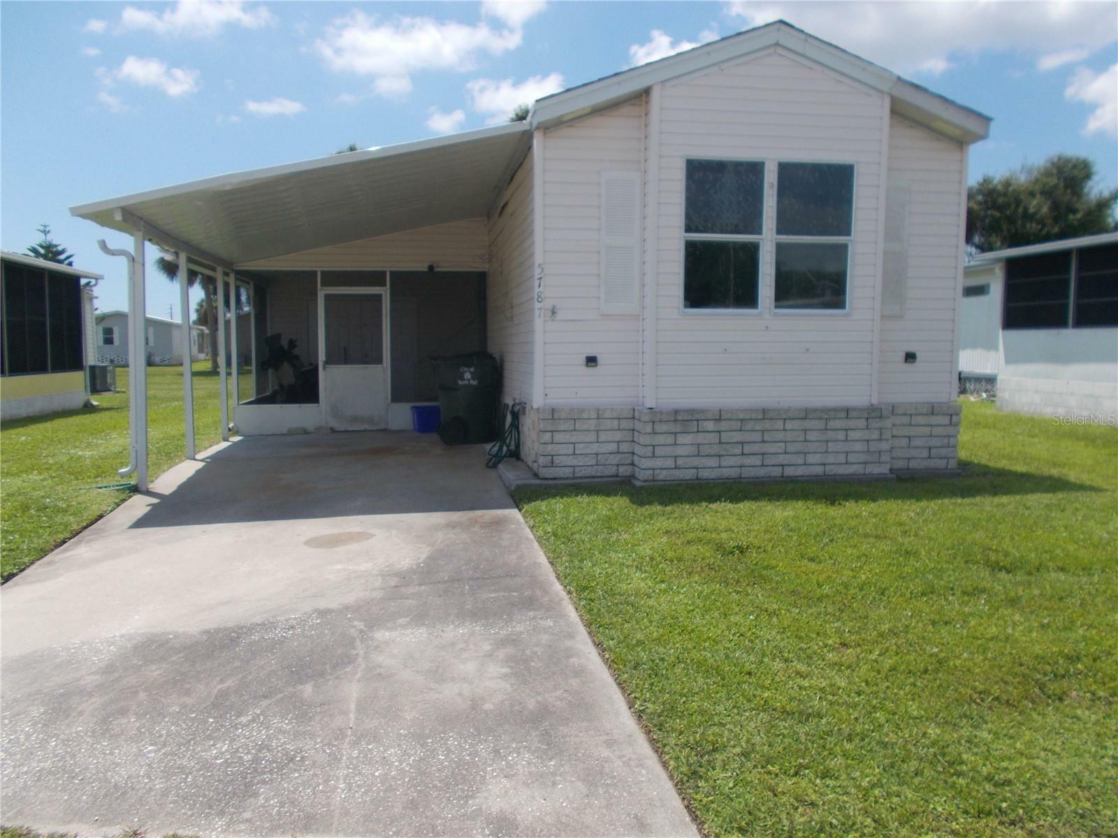 Property Photo:  5787 Holiday Park Boulevard  FL 34287 