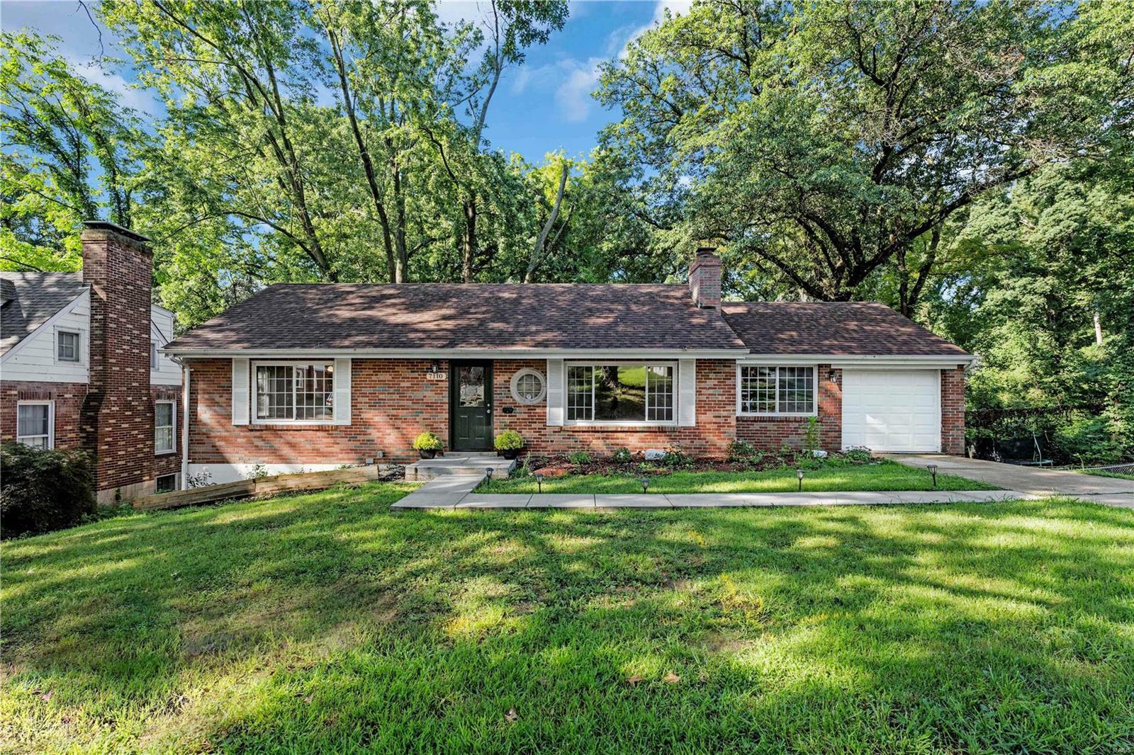 Property Photo:  7110 Roland Boulevard  MO 63121 