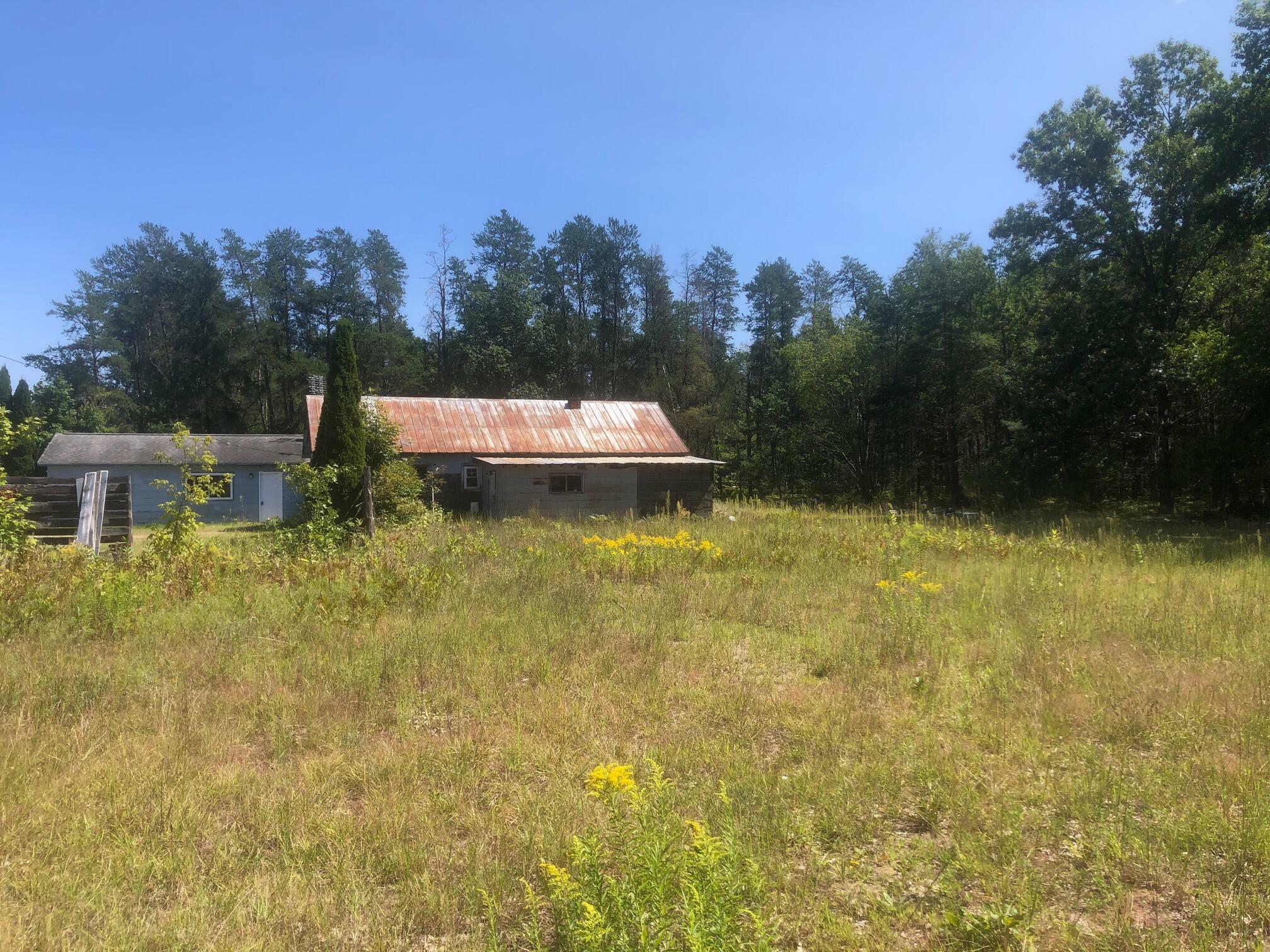 Property Photo:  14587 Nine Mile Rd  MI 49645 