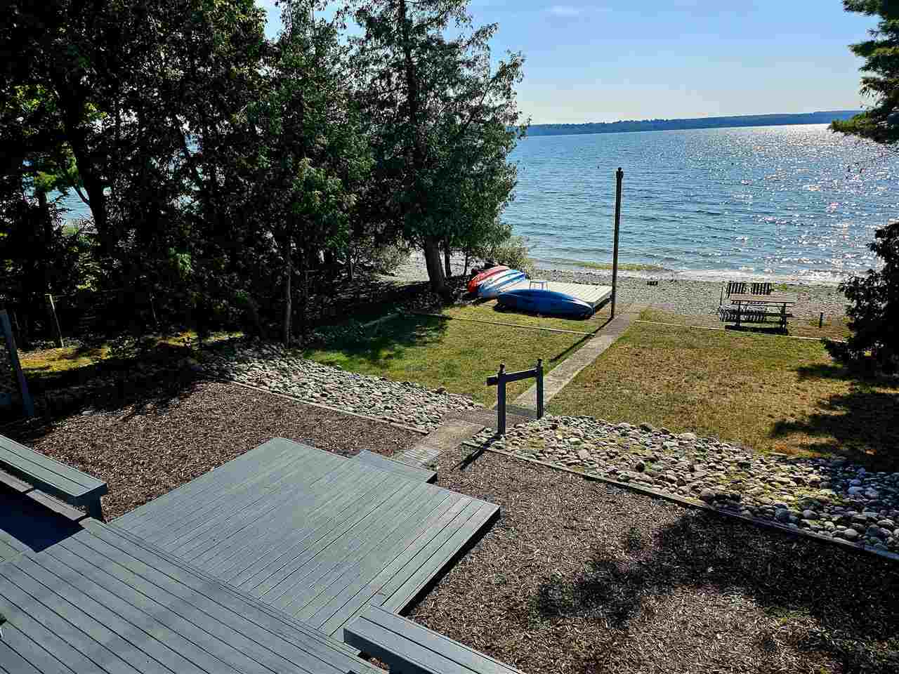 Property Photo:  3944 Springwater Beach Rd.  MI 49712 