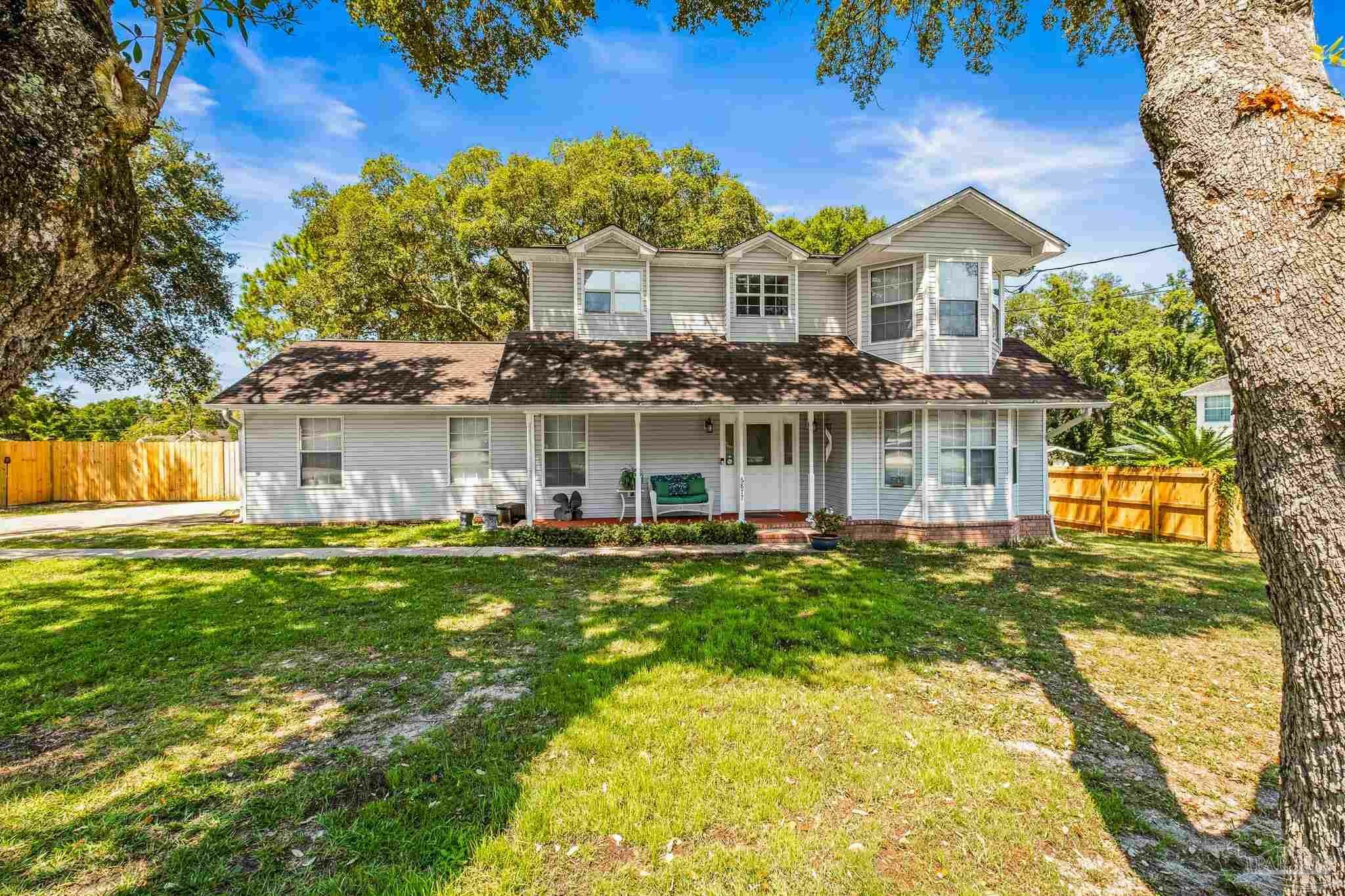 Property Photo:  6877 Cedar Lake Dr  FL 32526 