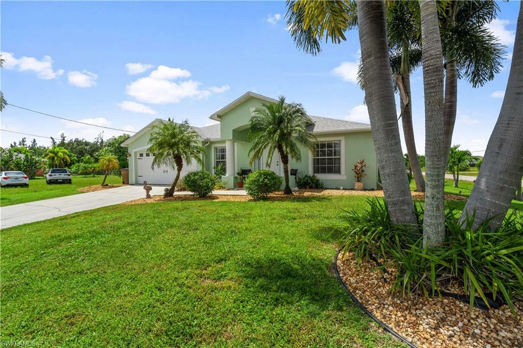 Property Photo:  1240 NW 26th Ave  FL 33993 