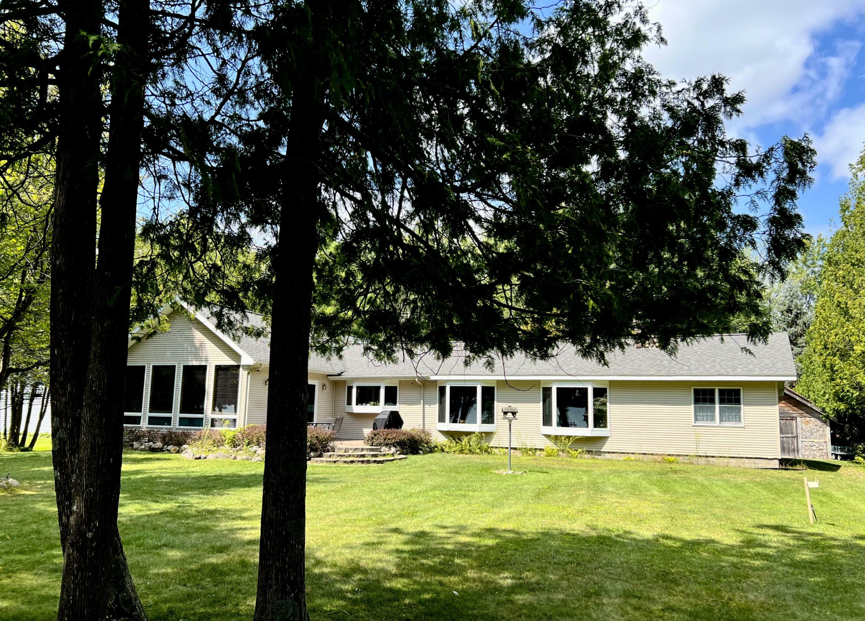 Property Photo:  7511 Feather Lane  MI 49721 