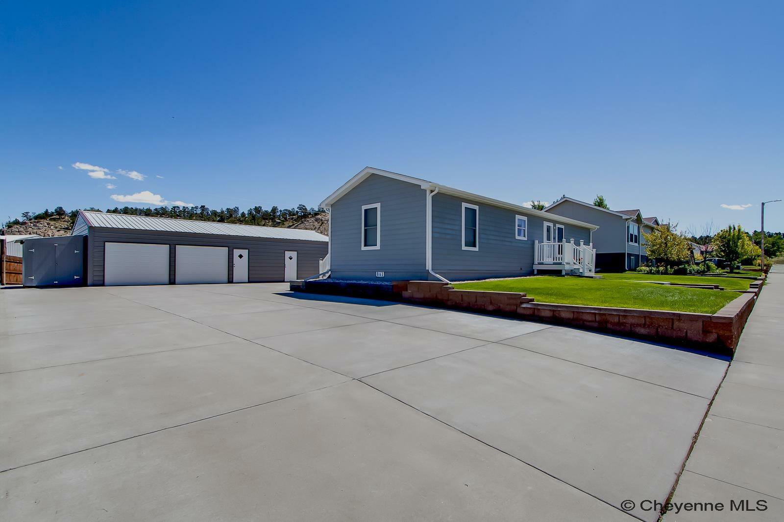 Property Photo:  645 Black Blvd  WY 82082 