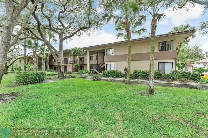 Property Photo:  9547 NW 2nd Pl 1B  FL 33071 