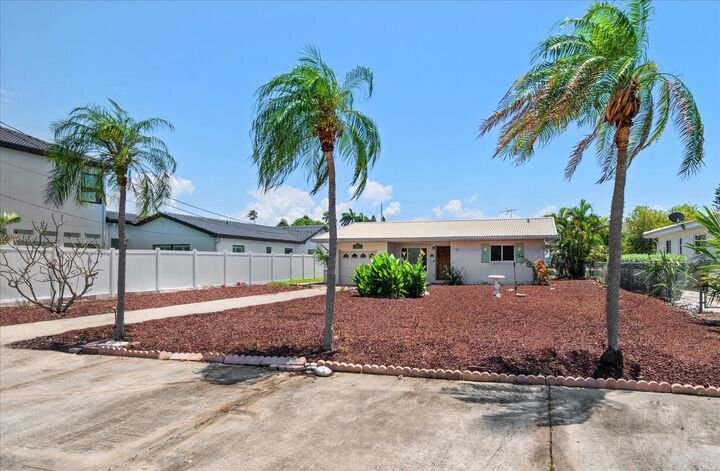 Property Photo: 16013 Redington Drive FL 33708