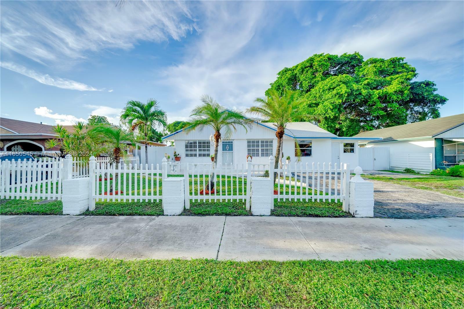 Property Photo:  725 NW 15th Ct  FL 33060 