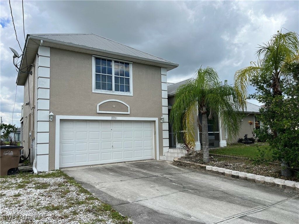 Property Photo:  3737 SW 11th Court  FL 33914 