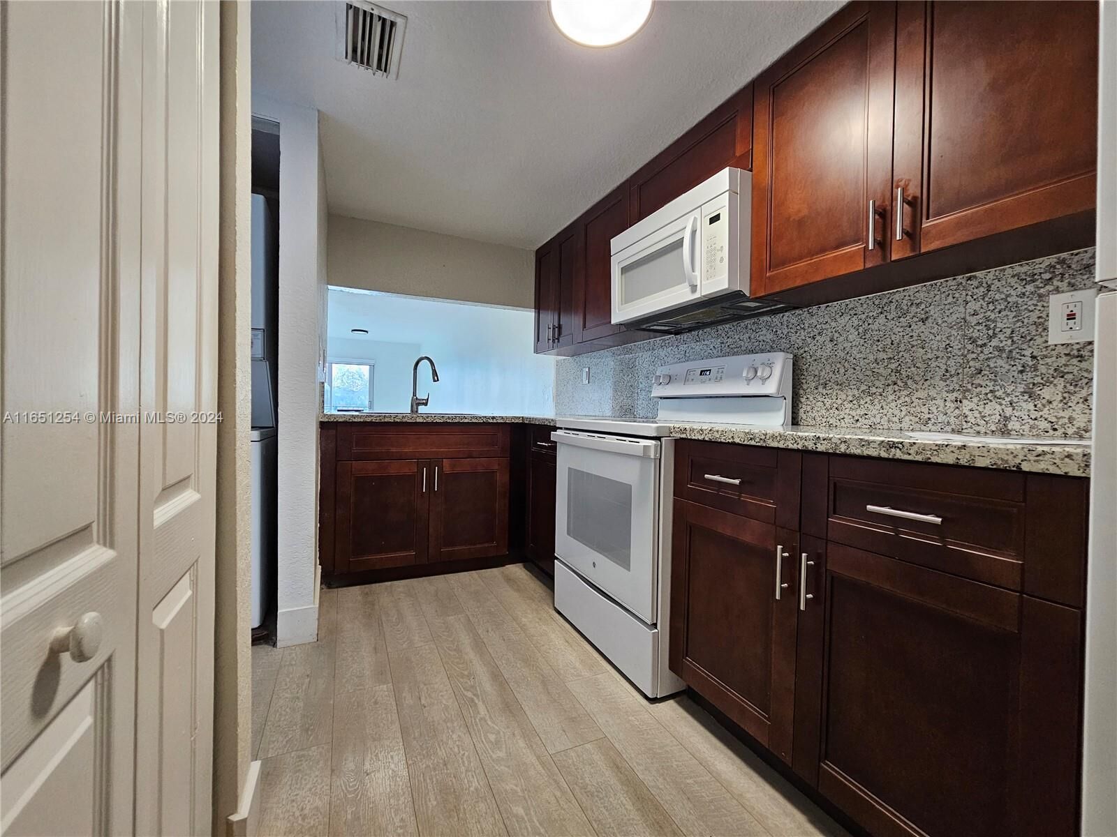 Property Photo:  9917 W Okeechobee Rd 3-108  FL 33016 