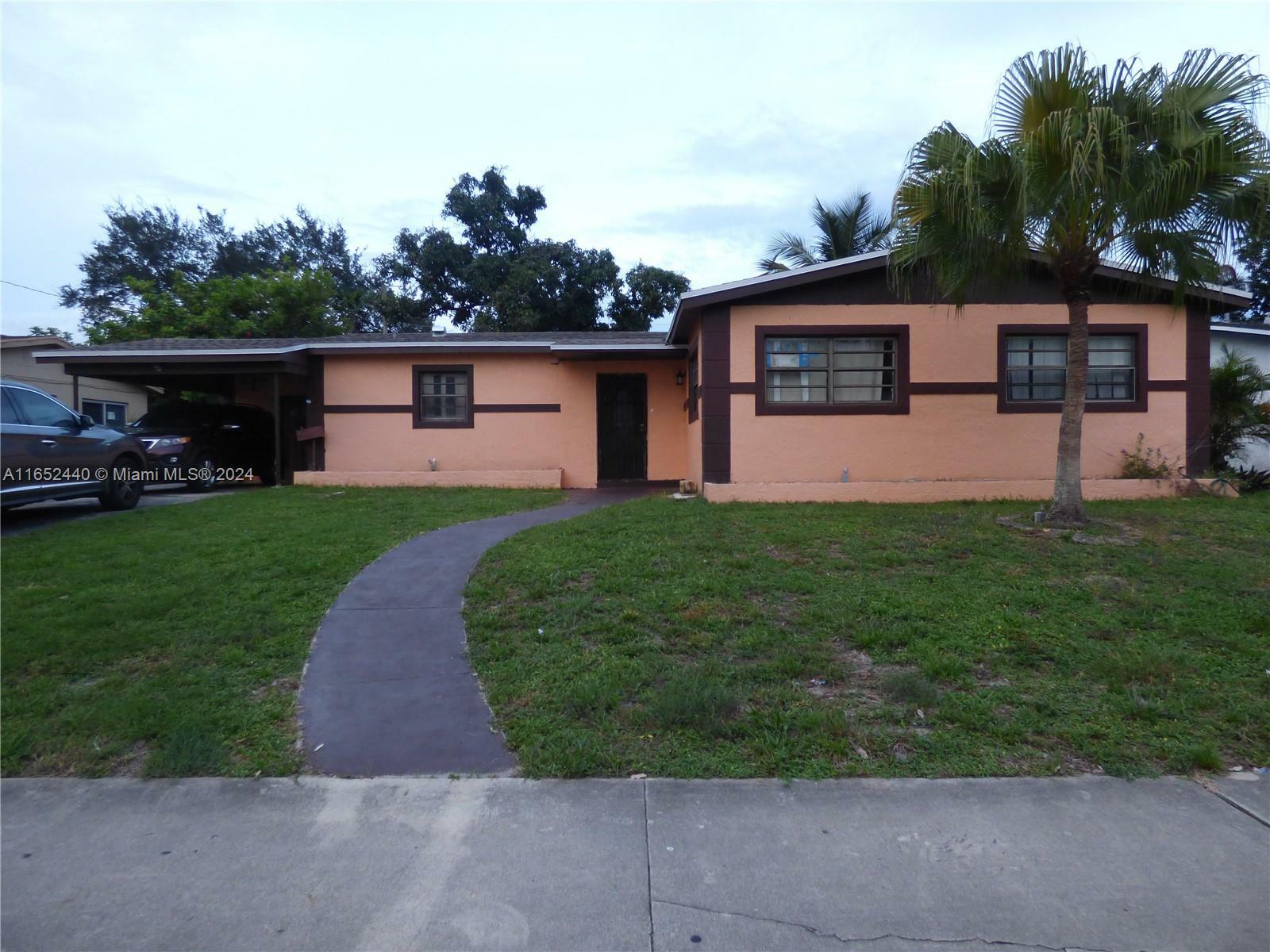 Property Photo:  19245 NW 12th Ave  FL 33169 