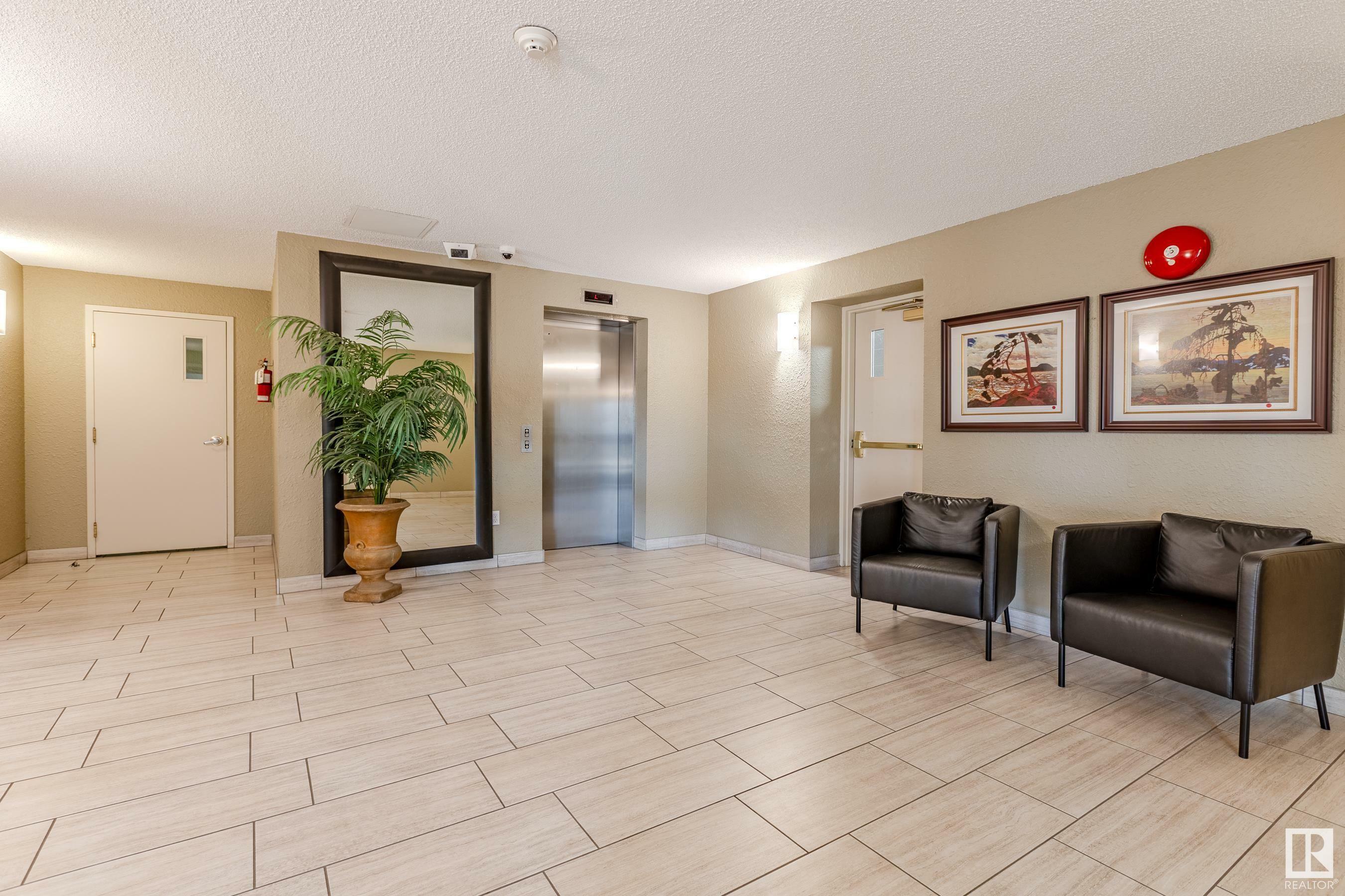 Property Photo:  3 Perron Street 308  AB T8N 5Z5 