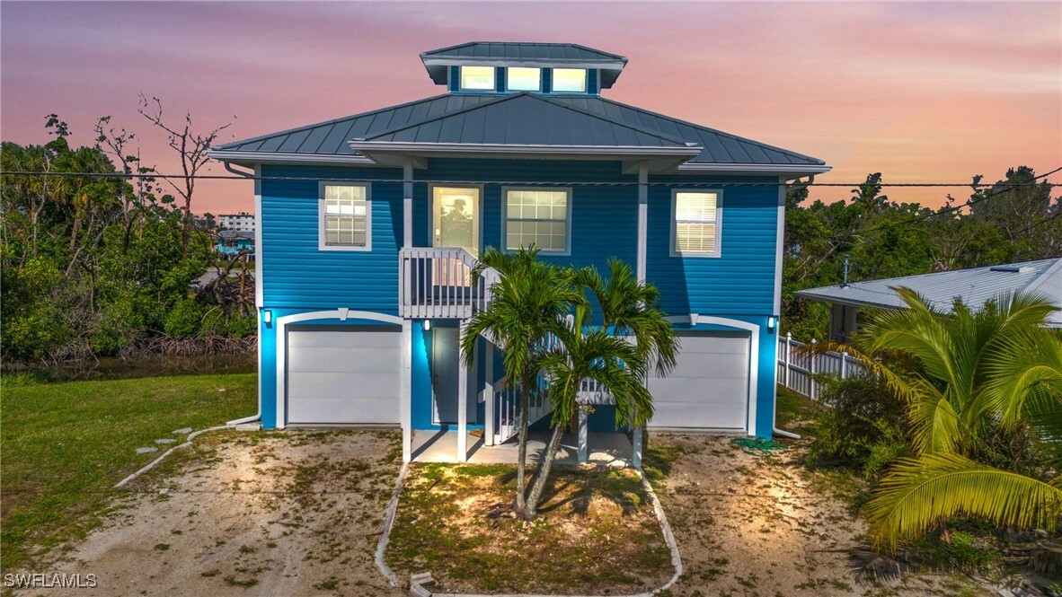 Property Photo:  103 Tropical Shore Way  FL 33931 