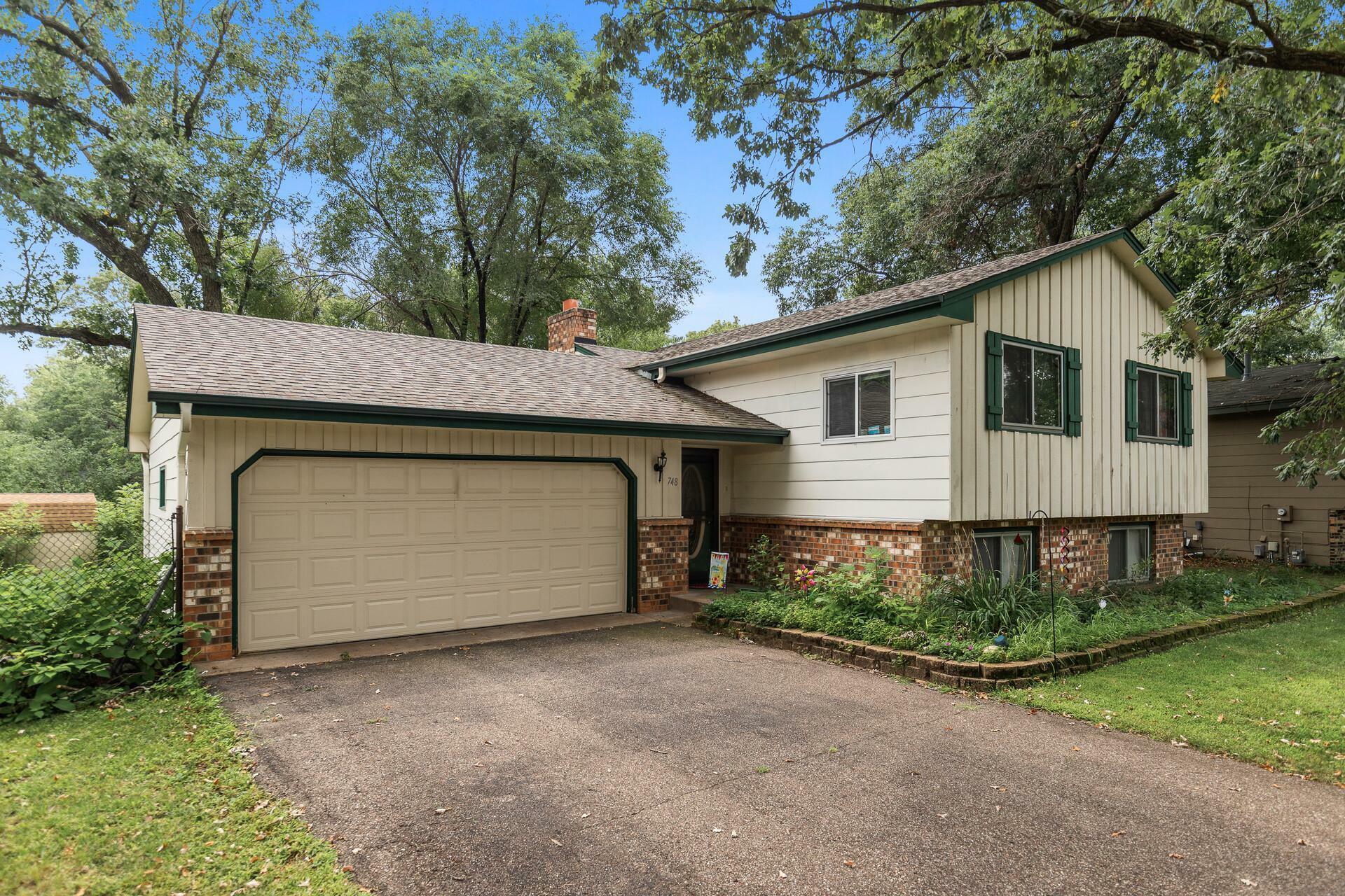 Property Photo:  748 129th Avenue NE  MN 55434 