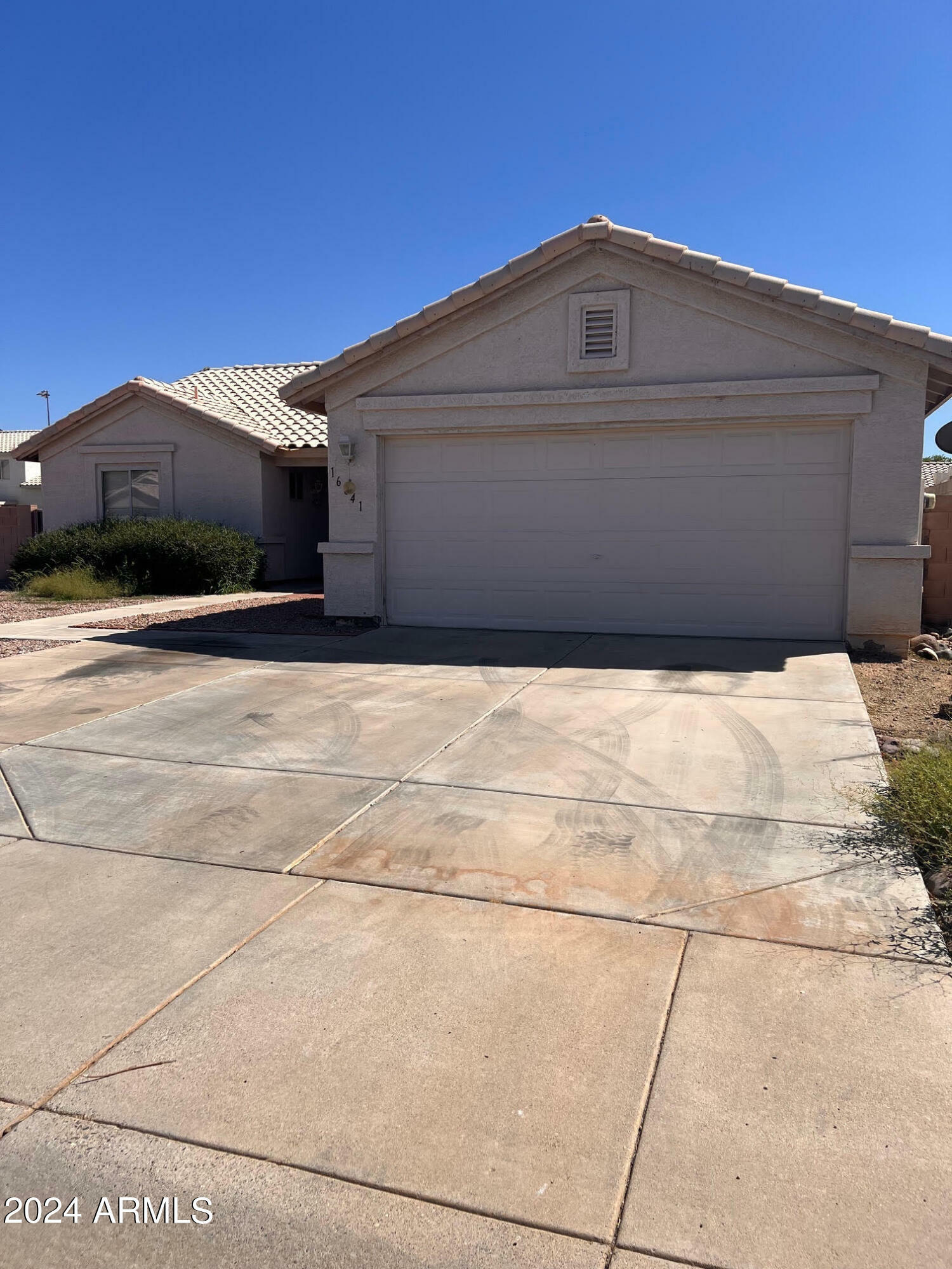 Property Photo:  16041 W Desert Bloom Street  AZ 85338 