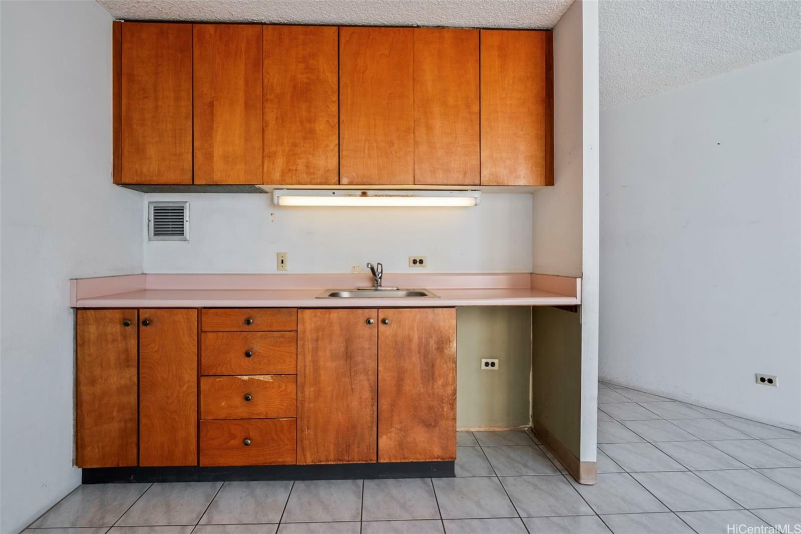 Property Photo:  750 Amana Street 1005  HI 96814 