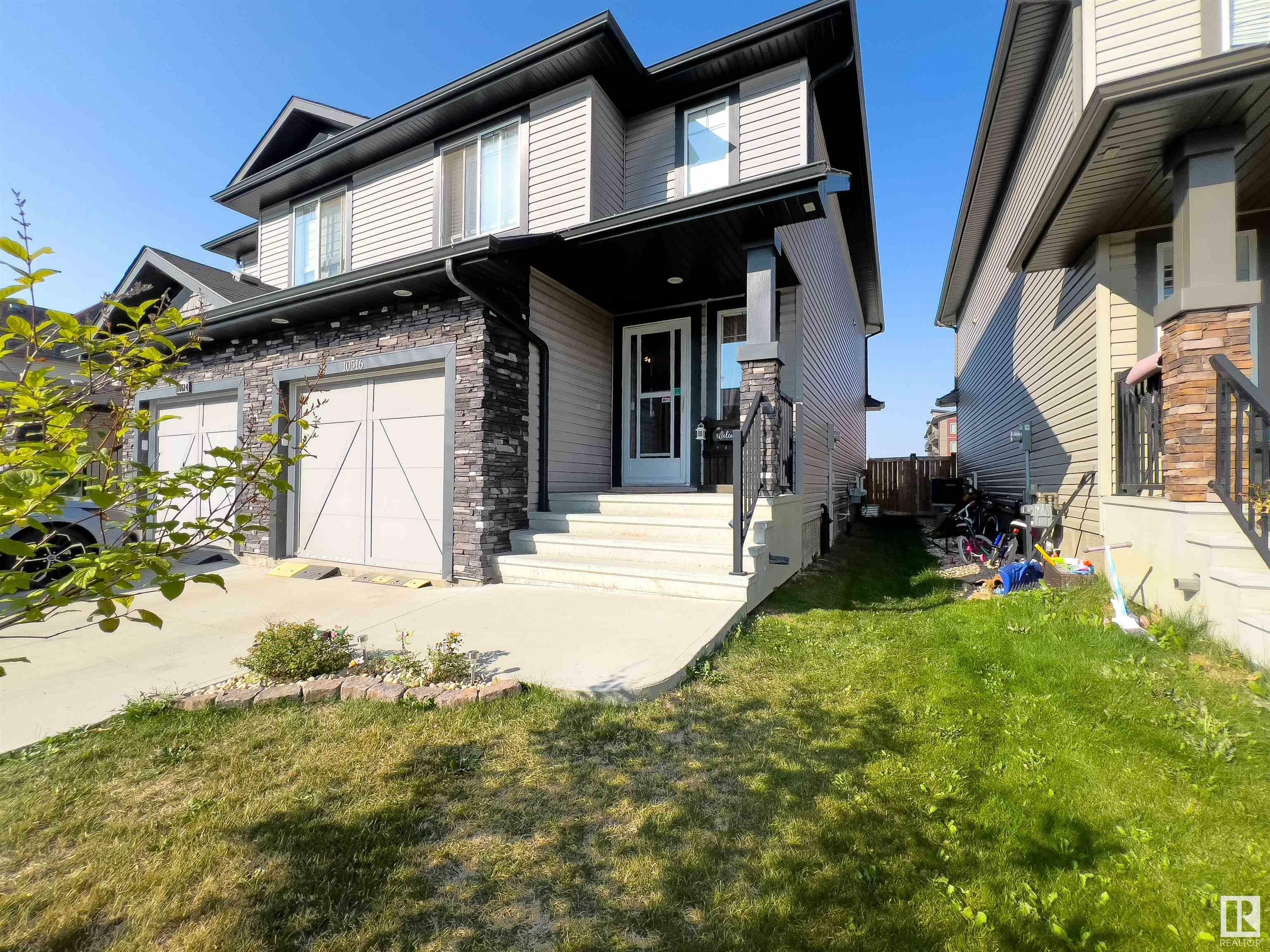 Property Photo:  10516 99 Street  AB T8R 2P1 