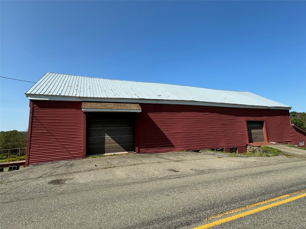 Property Photo:  821 & 809 State Line Road  NY 13865 