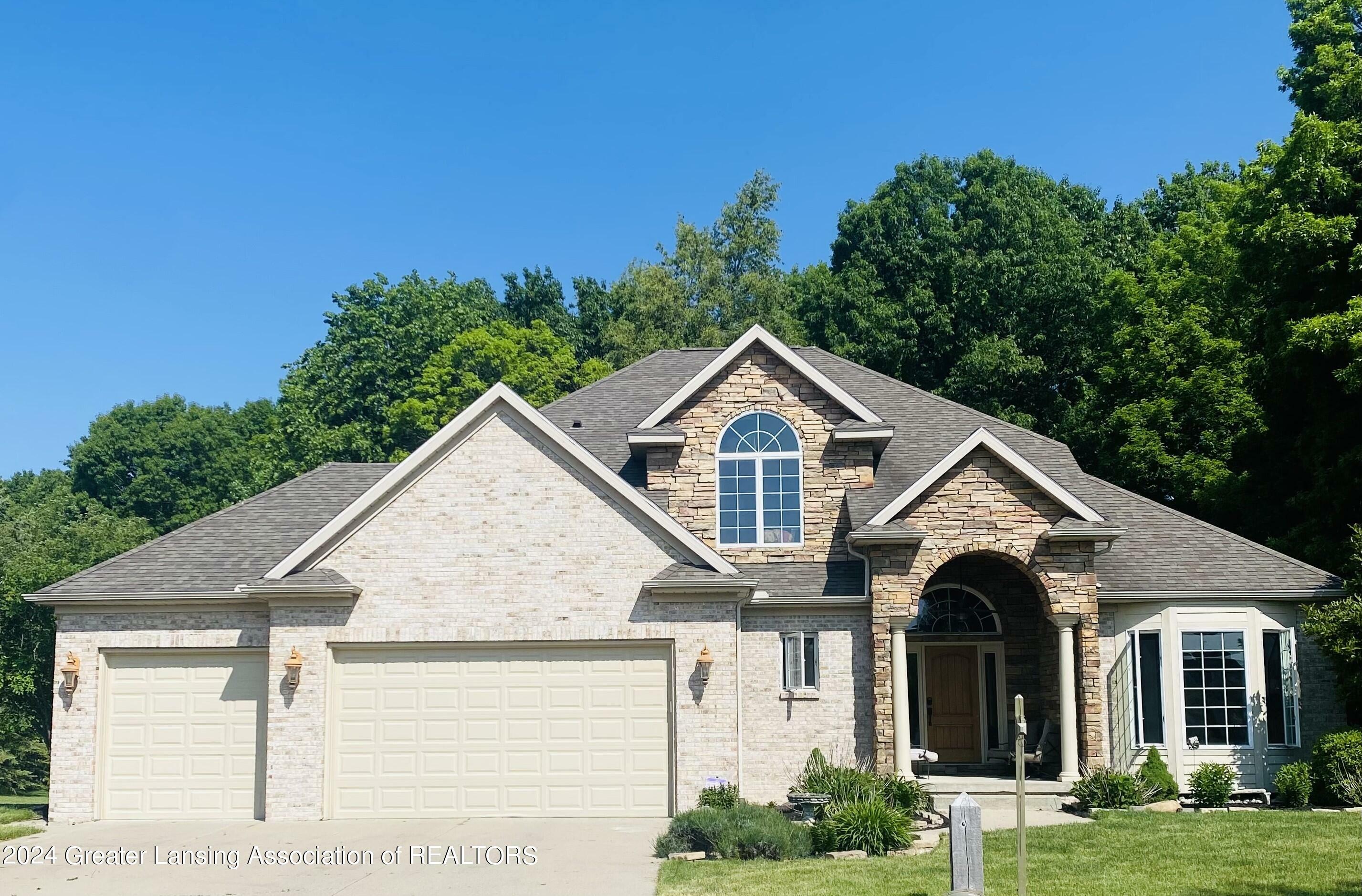 Property Photo:  4400 Chancellor Drive  MI 48820 