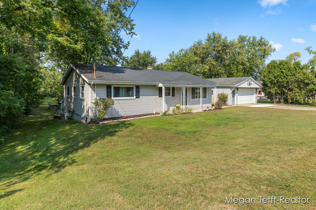 Property Photo:  13571 Woodrow Avenue NW  MI 49534 