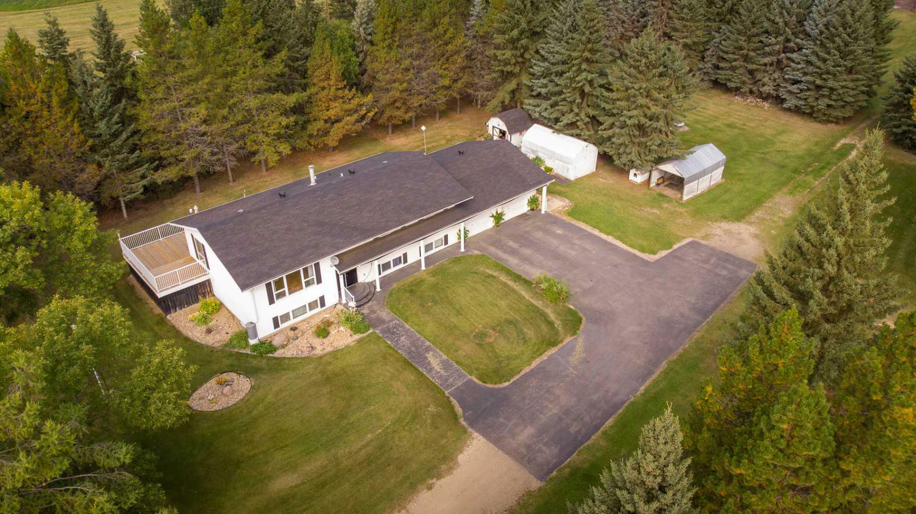 Property Photo:  224018 Township Road 672  AB T9S 2A4 