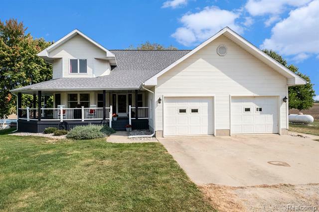 Property Photo:  8206 N McCaffrey Road  MI 48867 