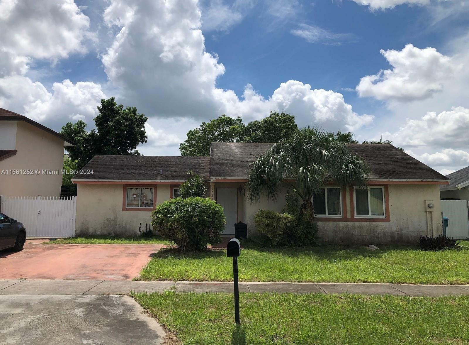 Property Photo:  12410 SW 203rd St  FL 33177 