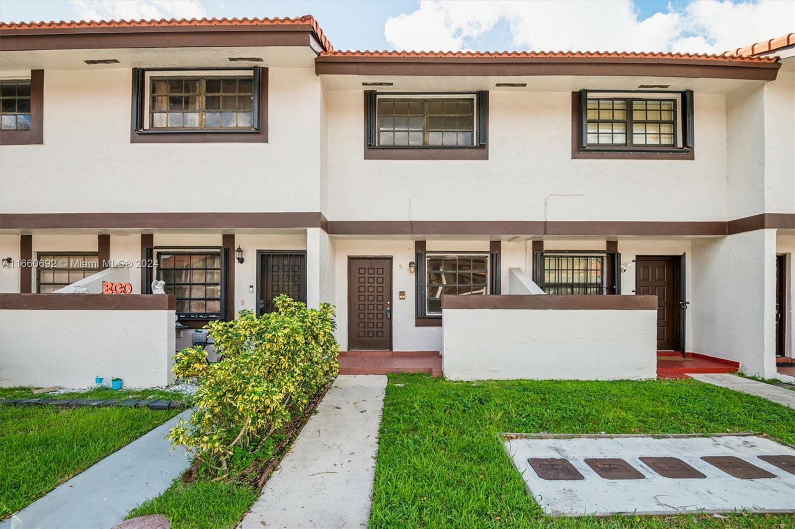 Property Photo:  13270 SW 58th Ter 9-5  FL 33183 