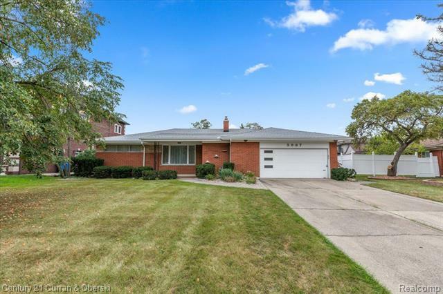 Property Photo:  5987 Campus Drive  MI 48127 