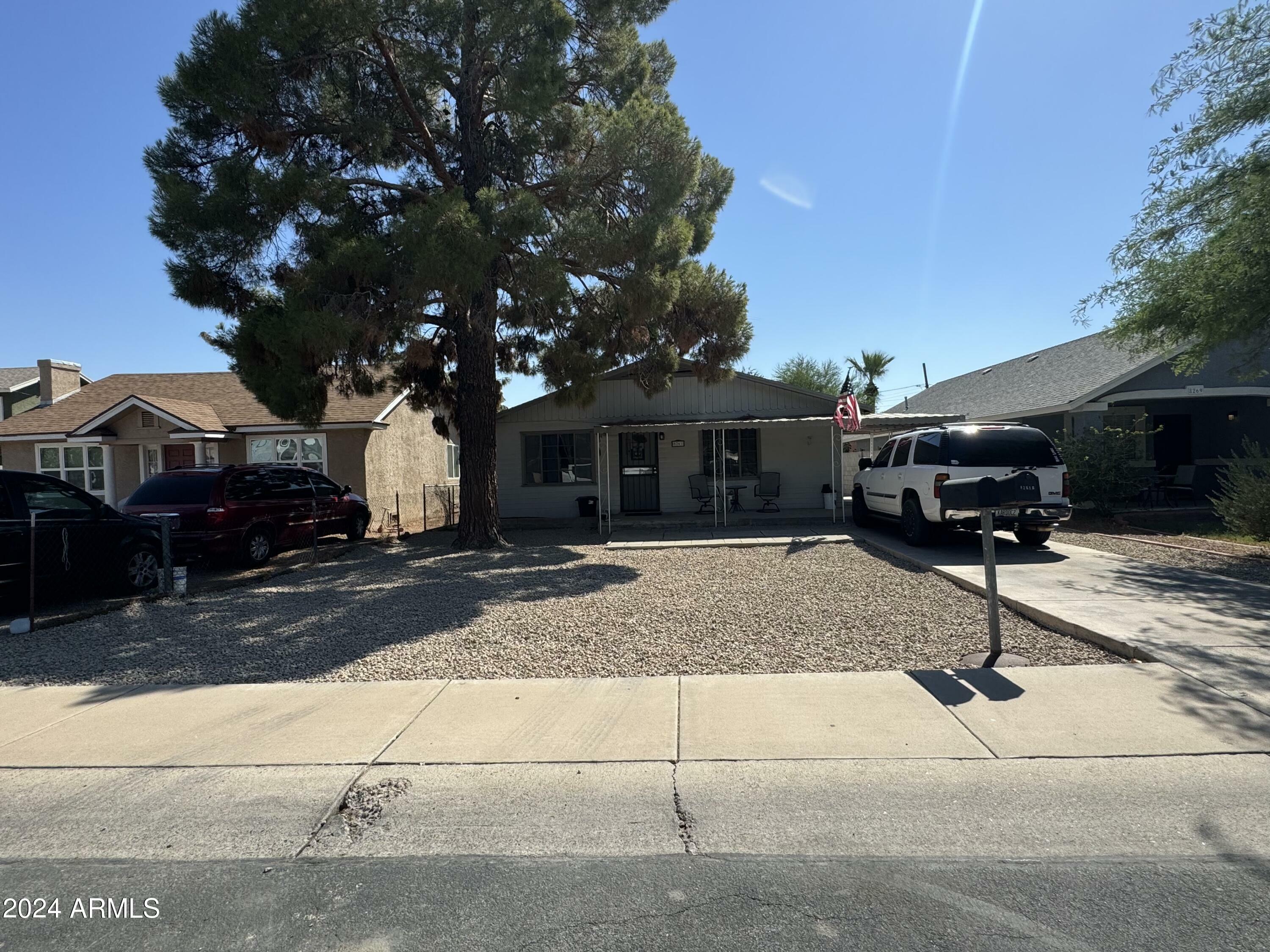 Property Photo:  8261 W Madison Street  AZ 85345 