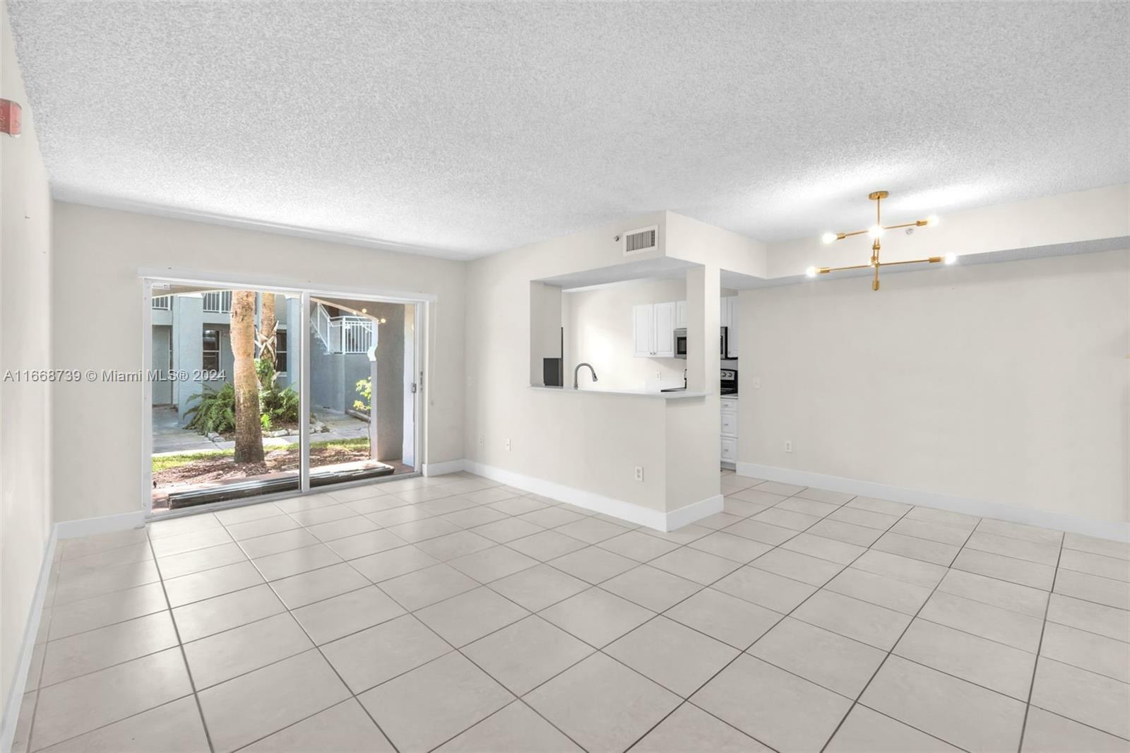 Property Photo:  9610 NW 2nd St 8-102  FL 33024 