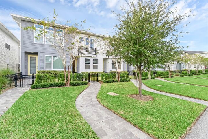 Property Photo: 8645 Tavistock Lakes Boulevard FL 32827