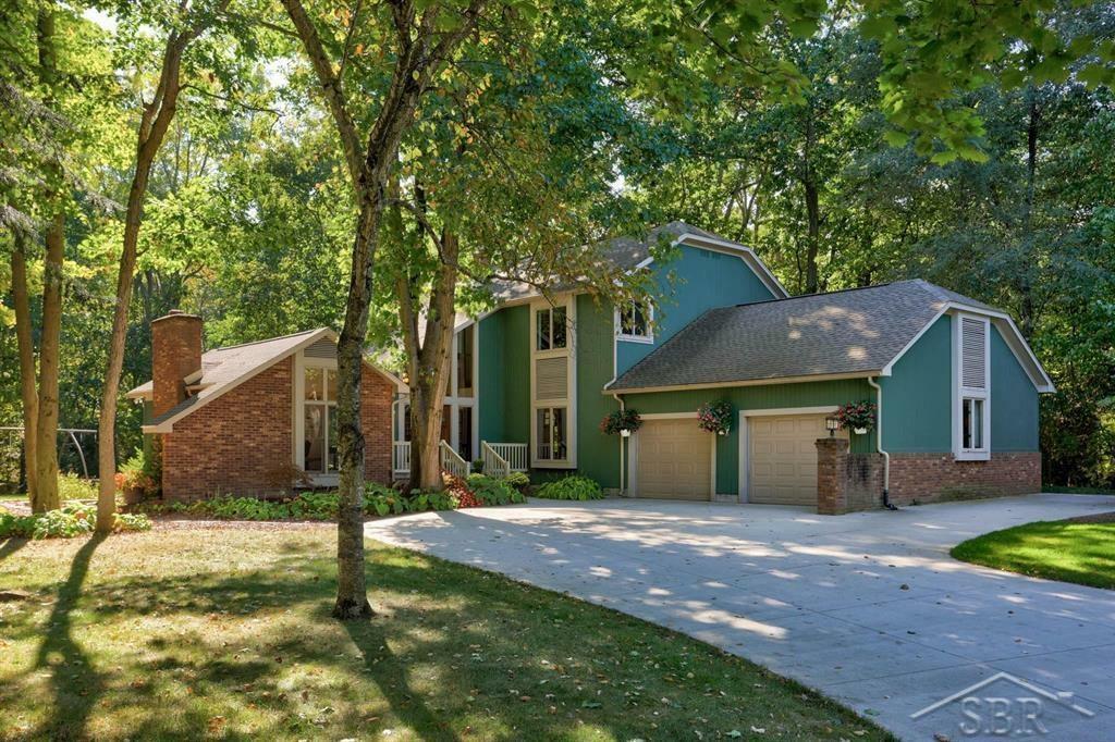 Property Photo:  4713 Oakridge Drive  MI 48642 