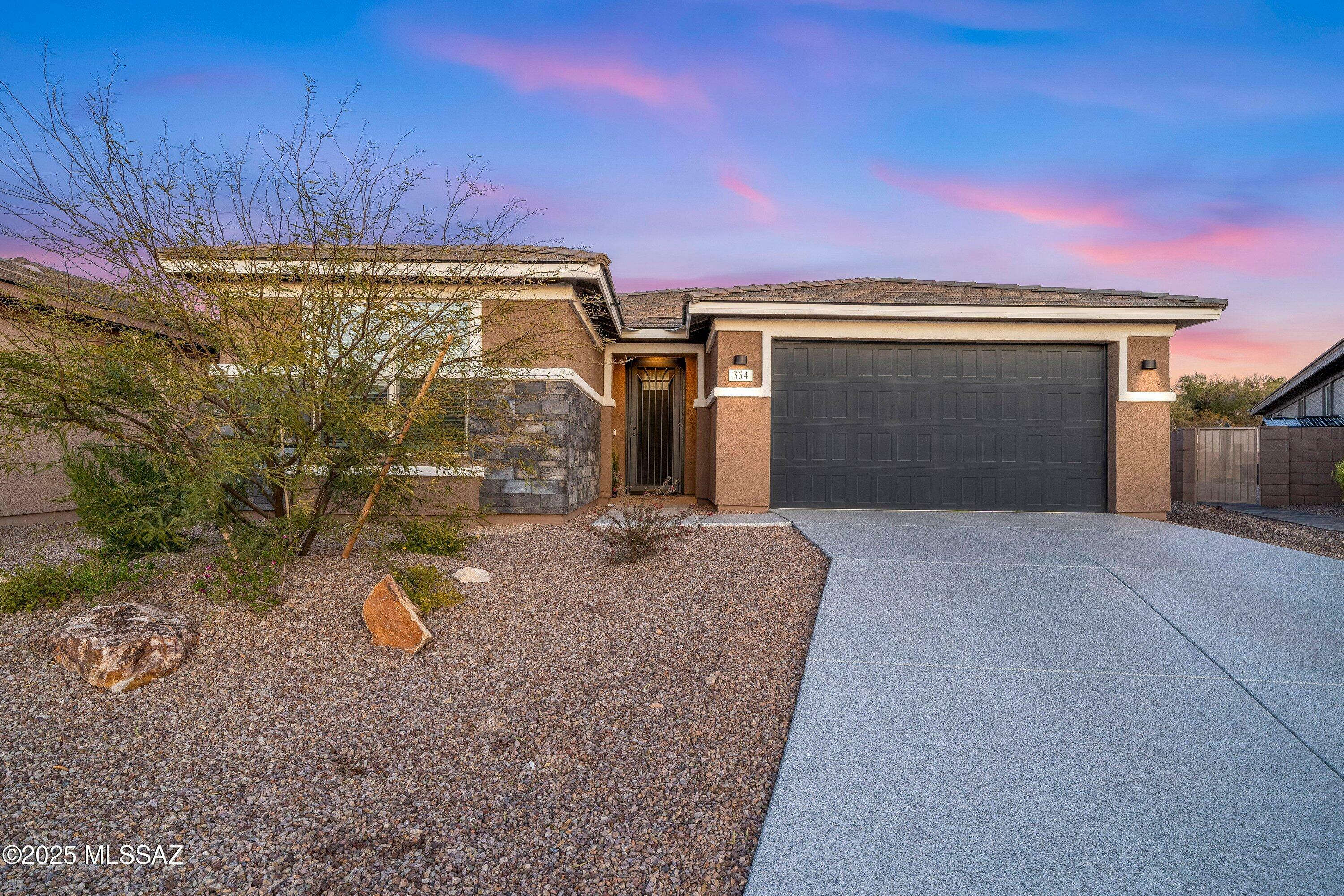 Property Photo:  334 N White Marble Avenue  AZ 85748 