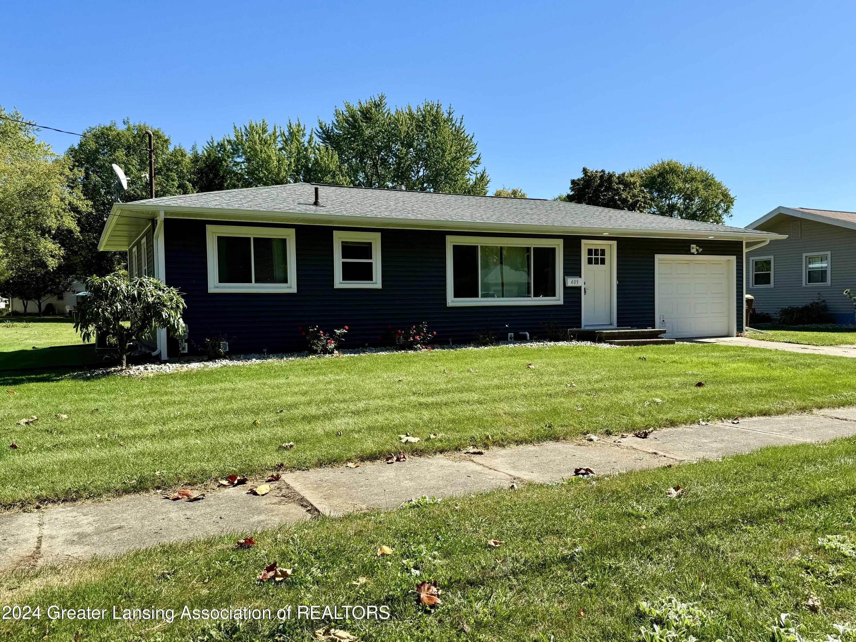 Property Photo:  409 S Kibbee Street  MI 48879 