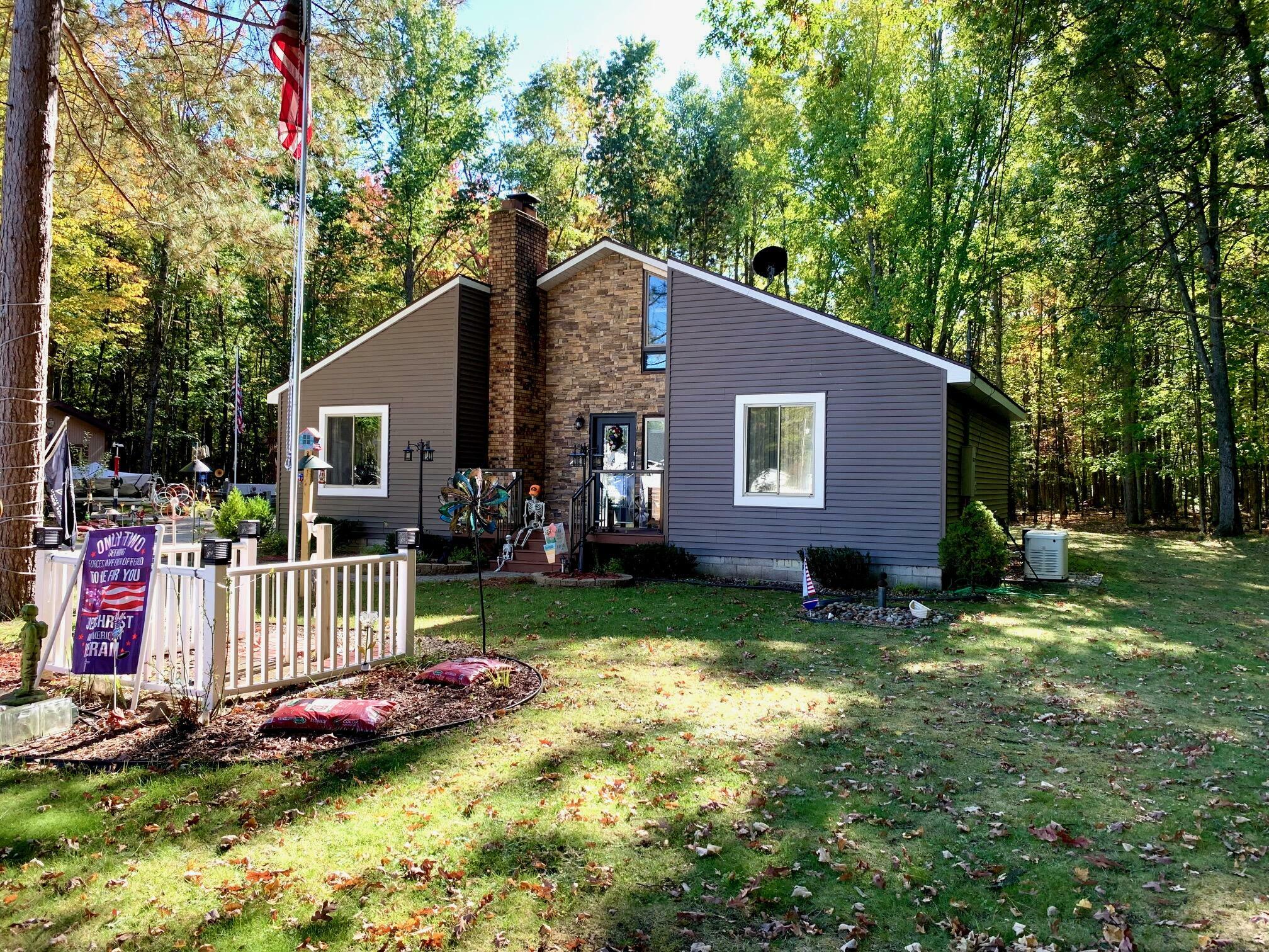 Property Photo:  111 Tallwood Court  MI 48651 