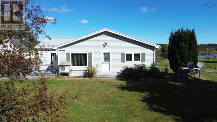 721 Descousse-Cap La Ronde Road — photo 1