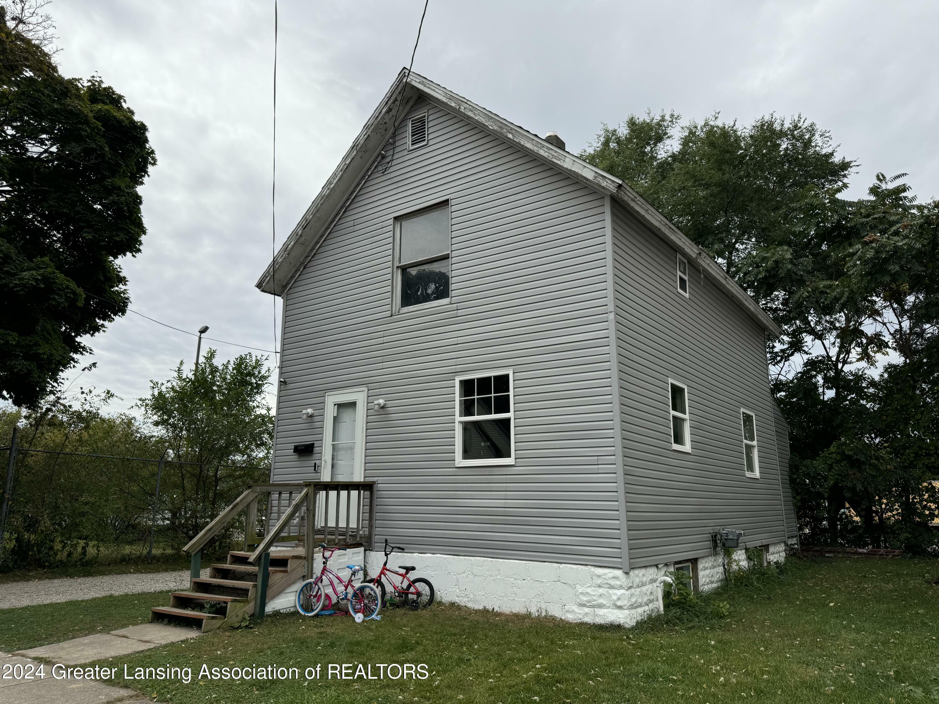 Property Photo:  1143 Ballard Street  MI 48906 