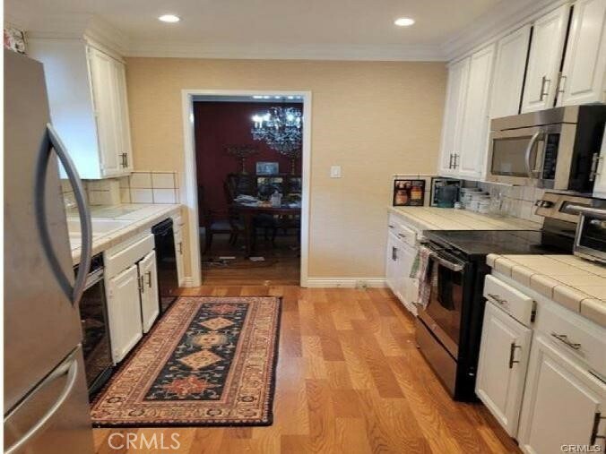 Property Photo:  5246 Beeman Avenue  CA 91607 