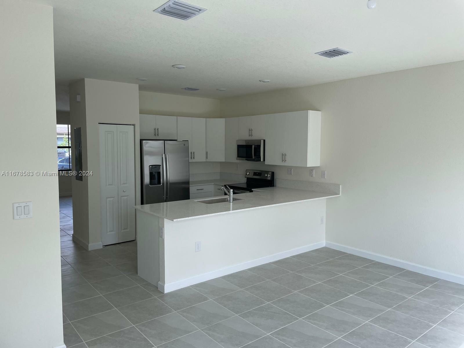 Property Photo:  11407 W 34th Ct  FL 33018 